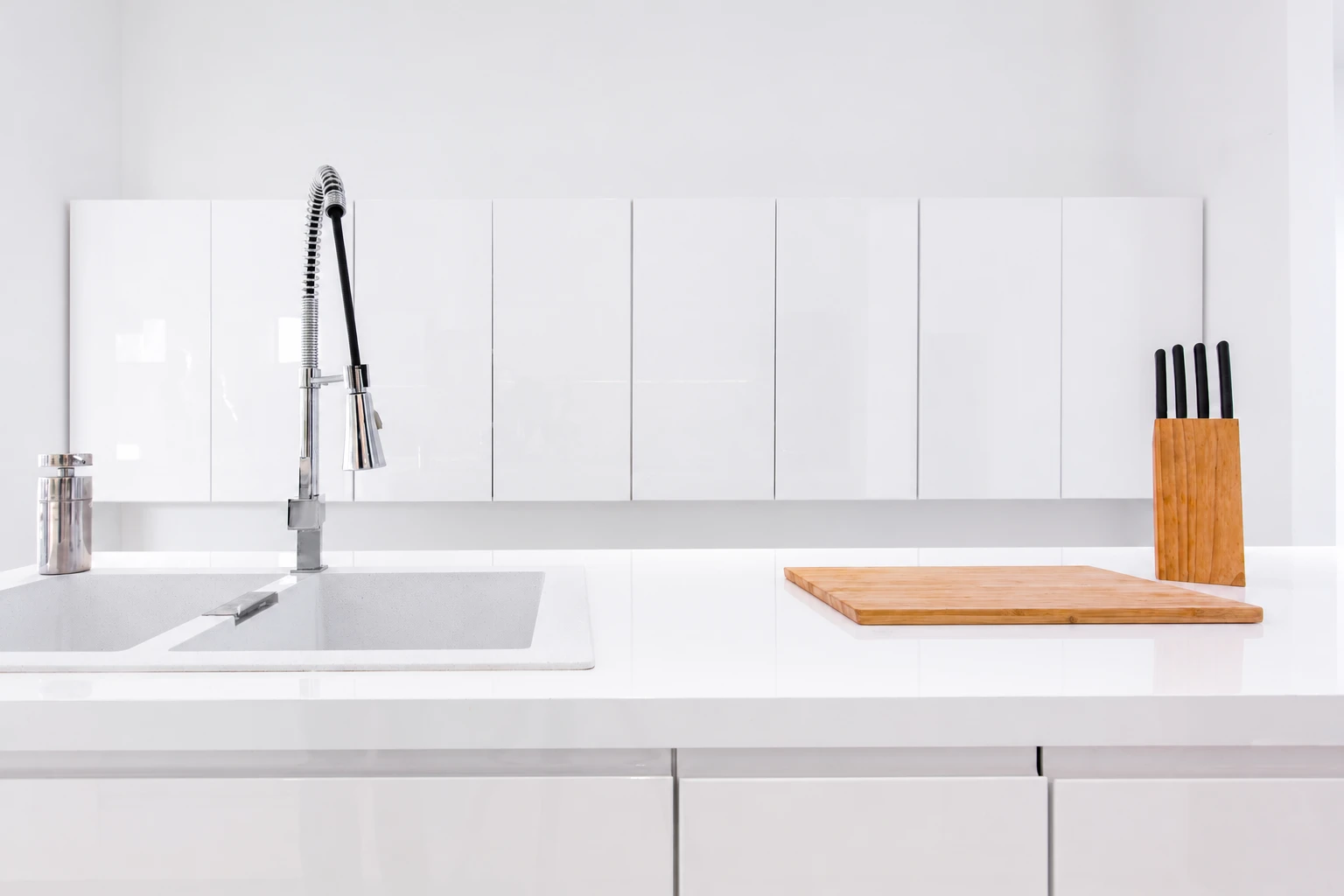White kitchen with custom stone countertops